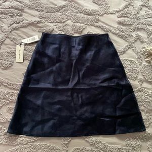 New w/ tags Aritzia mini slip skirt, size 4